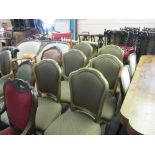 Set of six (four plus two) French style gilt dining chairs with upholstered backs and overstuffed
