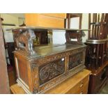 Early to mid 20th Century oak monks bench, the fold-over top above a box base