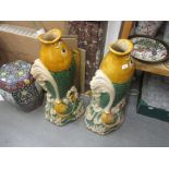 Pair of large Chinese pottery vases in the form of carp emerging from waves, 34ins high