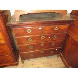 George III mahogany chest of two short and three long drawers with brass handles and escutcheons,