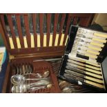 Oak cased part canteen of silver plated Art Deco design cutlery together with a few other additional