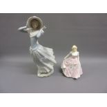 Lladro figure of a girl and a Doulton figure of a girl in pink