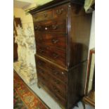 George III mahogany tallboy, the moulded key pattern cornice above three short and seven long