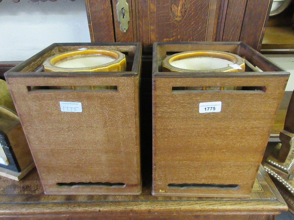 Pair of Japanese square hardwood planters with pottery inserts