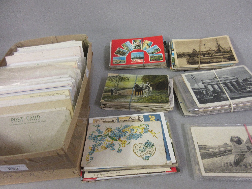 Box containing a quantity of various 20th Century and late 19th Century postcards including a