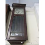 Early 20th Century Continental carved and stained rectangular Vienna type wall clock, the silvered