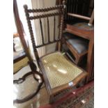 Pair of Victorian beechwood nursing chairs with bobbin turned backs and cane seats, together with