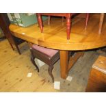 Modern French light oak circular extending dining table with two extra leaves together with a set of