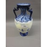 Royal Crown Derby baluster form three handled porcelain vase painted with various shipping, 10.