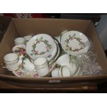 Royal Worcester porcelain floral painted cup and saucer, pair of 19th Century floral relief