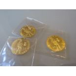 Three 1975 one Ducat gold coins