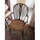 Set of six (four plus two) late 19th Century Windsor stick and wheel back kitchen open arm chairs (