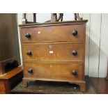 Small early 19th Century oak straight front chest of three graduated drawers with knob handles