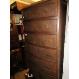 Reproduction mahogany six drawer bow front chest with brass handles and bracket feet