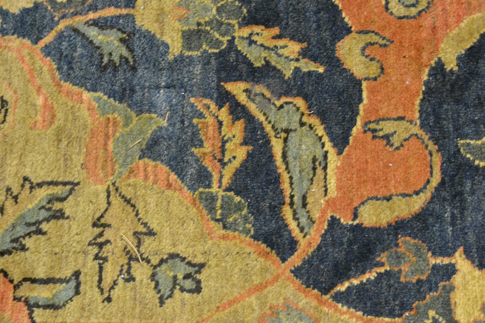 Agra carpet of all-over floral design on burgundy ground with multiple borders, 119ins x 167ins - Image 5 of 6