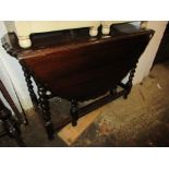 1930's Oak oval gate leg dining table on barley twist supports