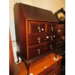 Edwardian mahogany bureau together with an Edwardian oval mahogany and line inlaid two tier