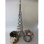 Iron coronet, floral painted metal bucket and a floor standing iron spiral twist obelisk
