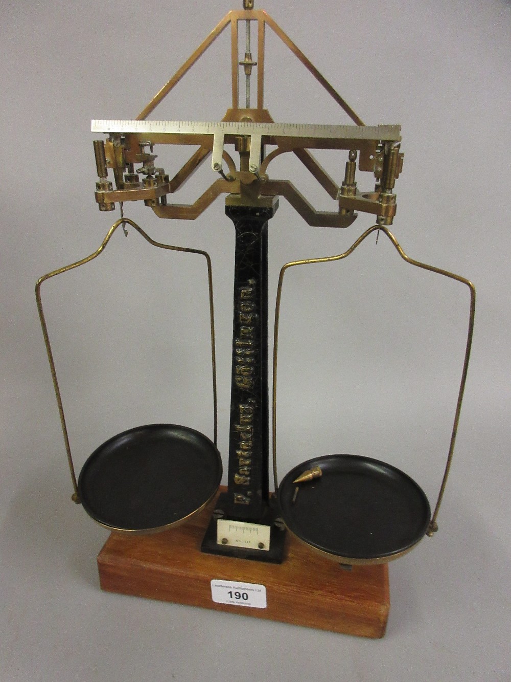 Pair of unusual balance scales in lacquered brass and cast iron, inscribed F. Sartorius on a