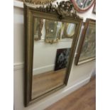 19th Century French gilt moulded composition rectangular wall mirror with shell and floral surmount