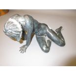 Mike Roberts, a dark patinated bronze of a crouching female nude, signed with initials, No. 10 of
