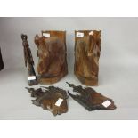 Pair of carved hardwood horse head book ends, together with a pair of Far Eastern carved hardwood
