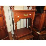 Small late Victorian walnut single drawer side table on turned supports with undertier 23ins wide