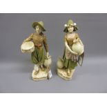 Pair of Royal Dux figures of a Dutch boy and girl in traditional costume, 10ins high
