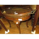Walnut oval occasional table with glass tray top