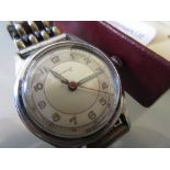 Gentleman's mid 20th Century Accurist wristwatch with a stainless steel case, champagne dial, Arabic