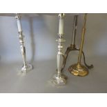 Pair of silver plated hexagonal table lamp bases with cream shades, brass adjustable table lamp base