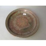 Circular Middle Eastern engraved copper bowl