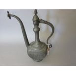 Middle Eastern silvered copper vessel with hinged cover, engraved with figures, 16ins high
