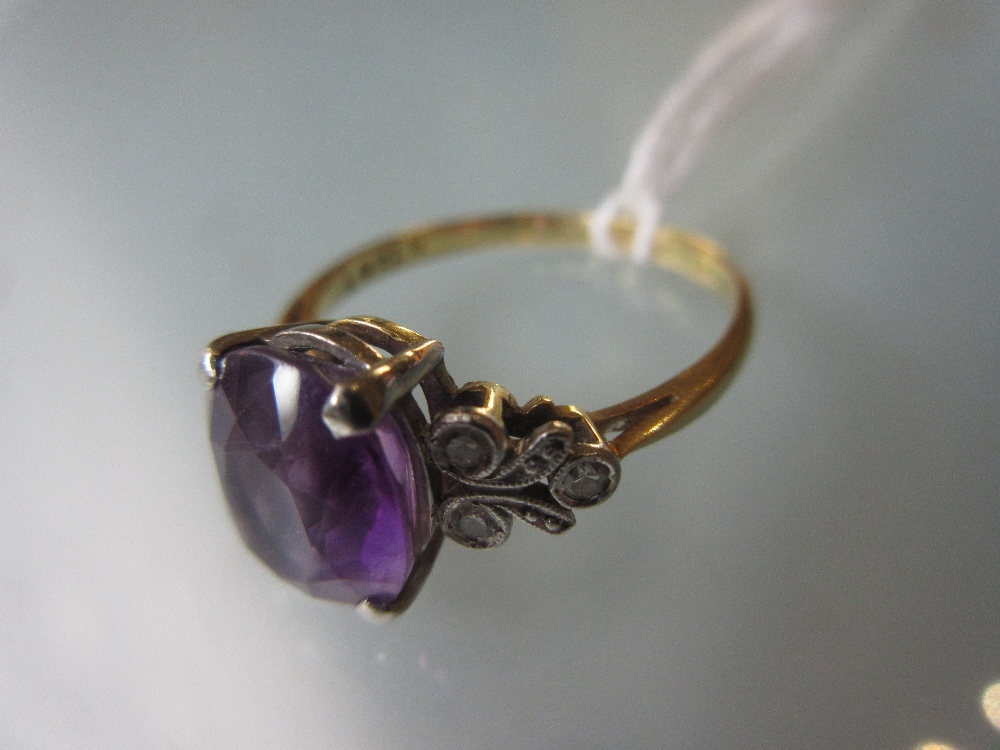 18ct Yellow gold ring set amethyst with diamond set shoulders