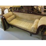 Regency mahogany and cut brass inlaid sofa raised on turned tapering front supports