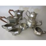 Two hand beaten pewter four piece teasets