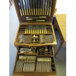 Oak cased canteen of silver plated Art Deco pattern cutlery for twelve places, in a floor standing