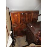 20th Century mahogany drinks cabinet, the fall front enclosing a maple lined and mirrored interior