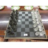 20th Century moulded glass chess set, together with a Lalique glass chessboard Multiple chips to