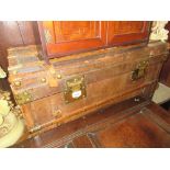 19th Century leather and wood banded trunk with brass fittings