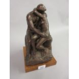 20th Century Austin bronzed composition reproduction sculpture of Rodin's ' The Kiss '