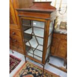 Edwardian mahogany and satinwood crossbanded display cabinet with a single bar glazed door enclosing