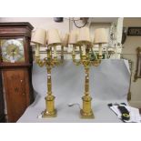 Pair of good quality French Empire gilt metal five light candelabra on square bases with circular