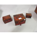 Graduated set of three late 19th / early 20th Century red stained tortoiseshell rectangular caskets
