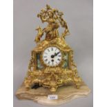 Reproduction French gilt brass figural mantel clock mounted on a marble platform base