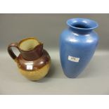 Poole Pottery baluster form vase together with a Doulton Lambeth harvest jug