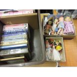 Two small boxes containing a collection of hard plastic 20th Century dolls, bag of various doll