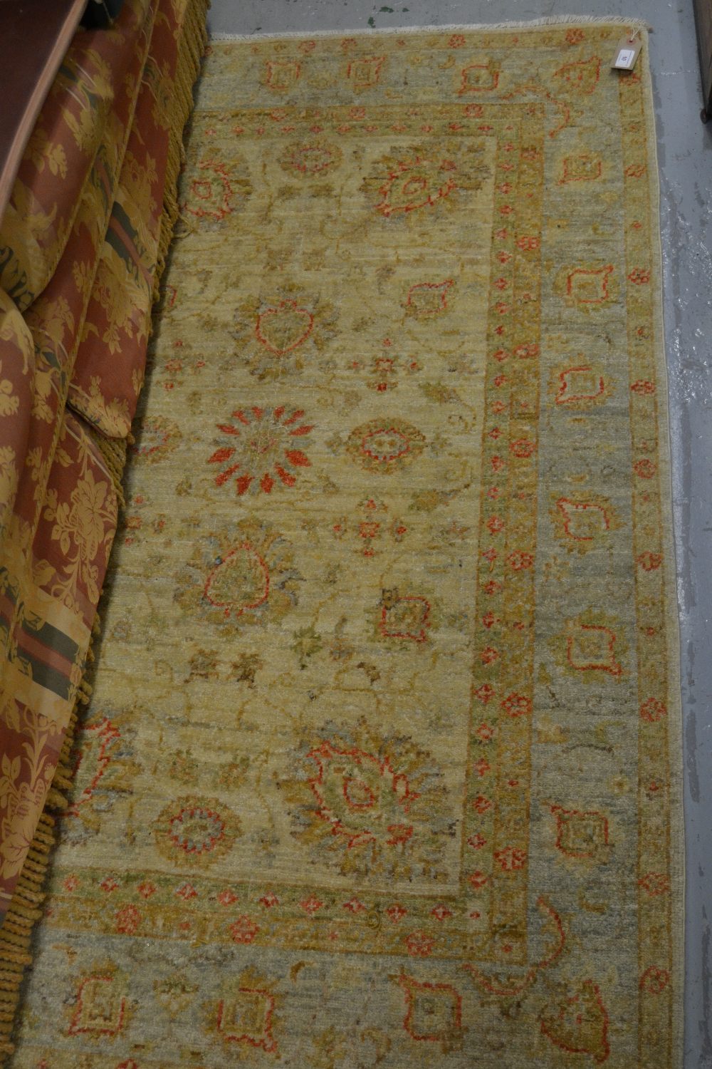 Small Afghan Ziegler rug with an all-over floral design on an ivory ground, 60ins x 40ins