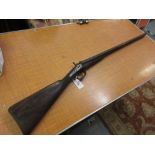 Antique pin fire double barrel shotgun with walnut stock (at fault)