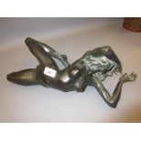 M. Belov, dark patinated bronze of a reclining female nude, signed and No. 2 of 9, 16ins wide